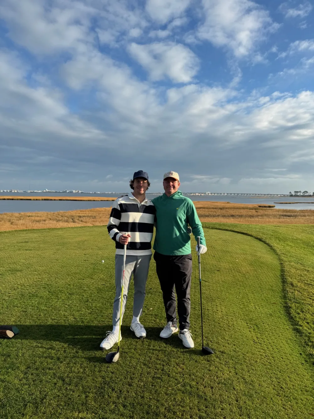 A pair on the tee under a big Eastern Shore sky