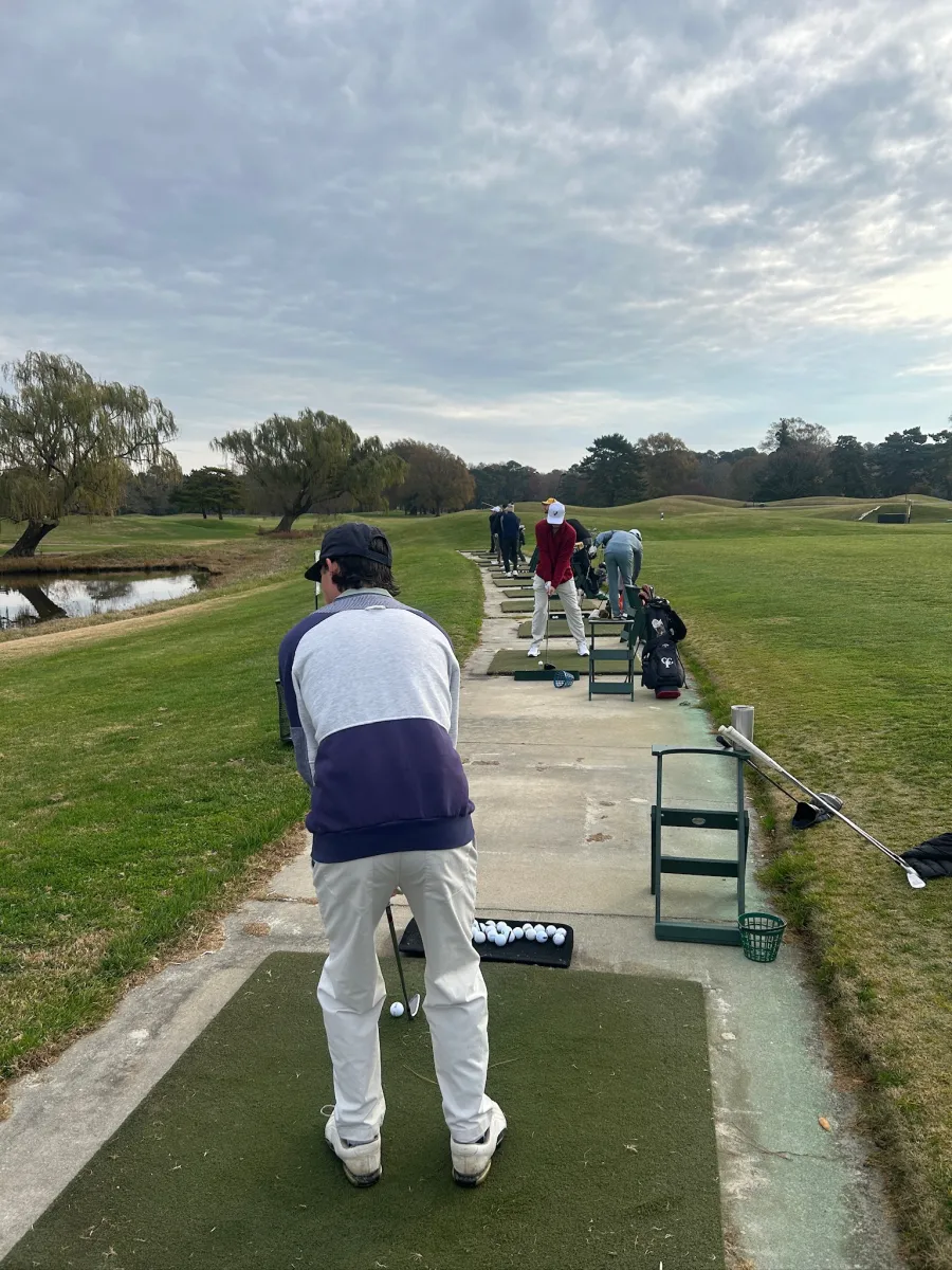 Warming up on the range, willows and a grey sky down the line